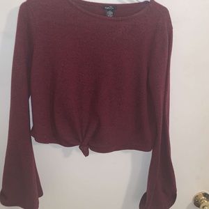 red sweater crop top